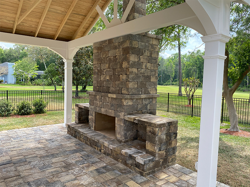 Outdoor Fireplace by Patriot Landscape Solutions
